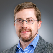 headshot of James Grimmelmann on gray background