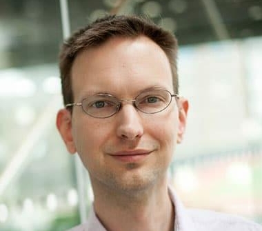 headshot of David Minmo inside background