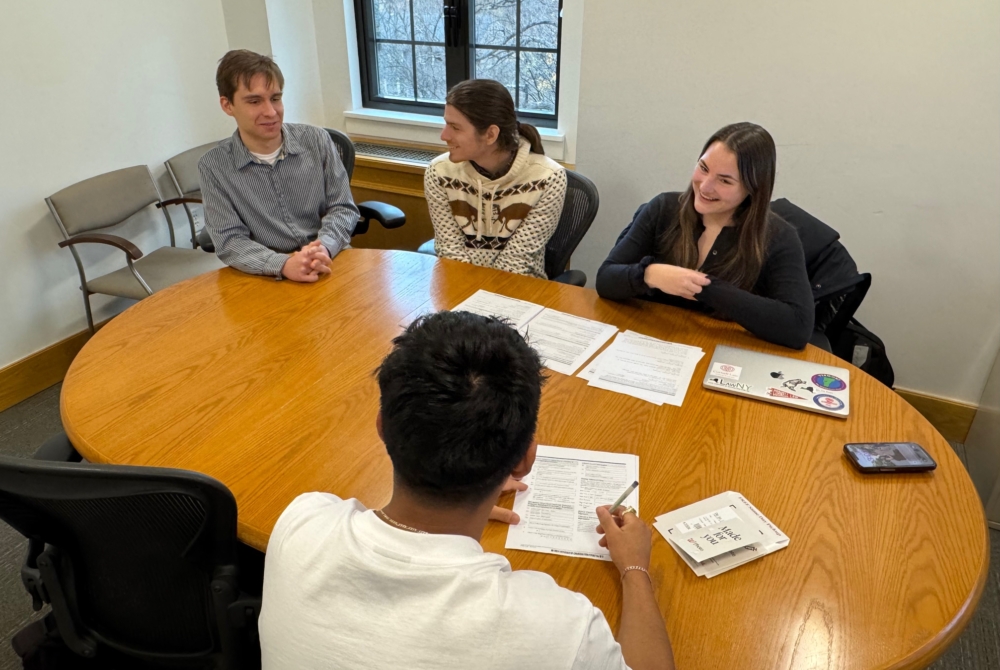 three students and a client