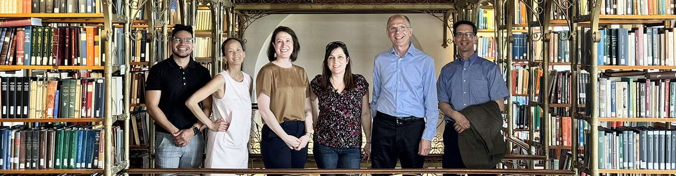 group standing in a library